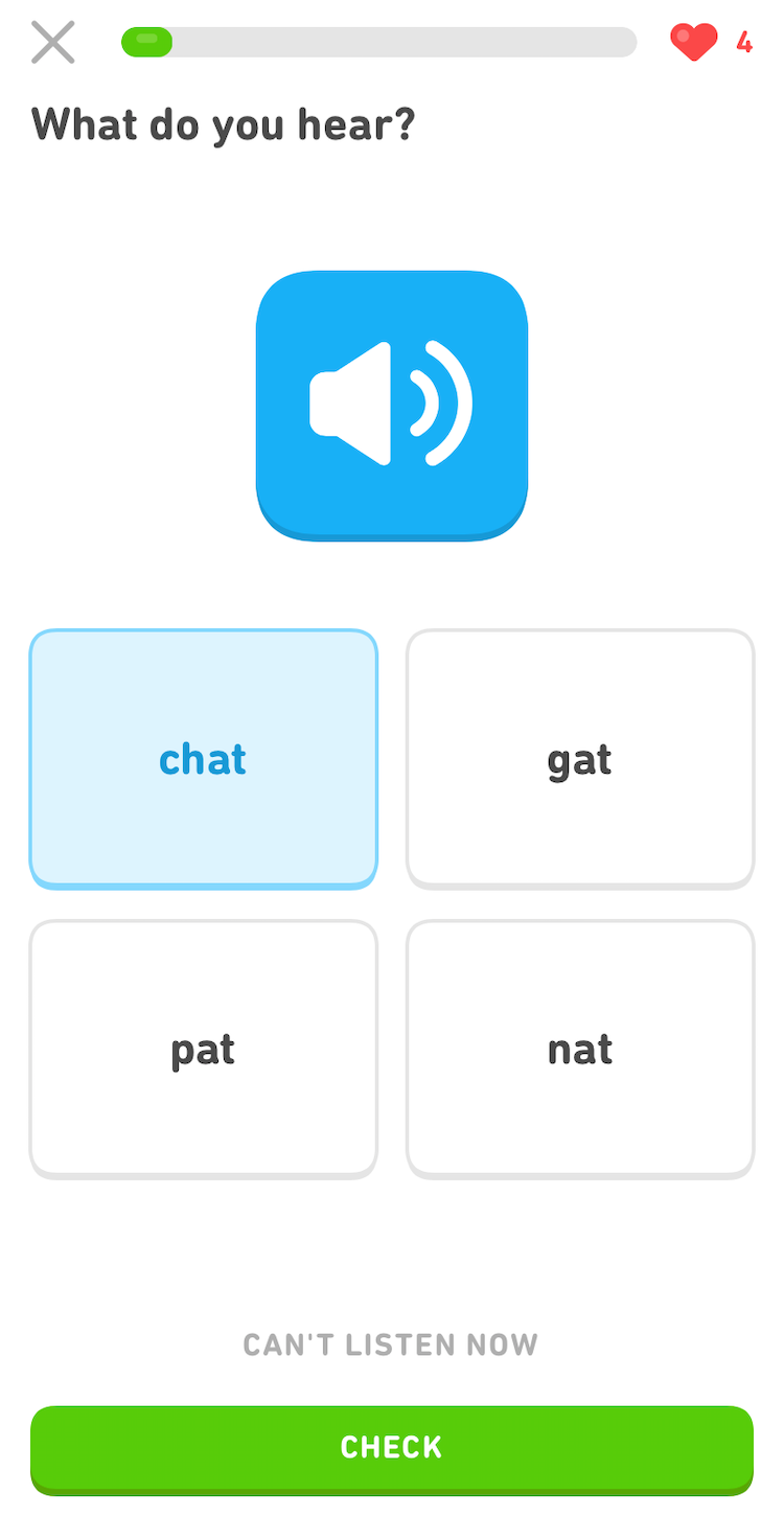 Screenshot of an exercise with a large audio button and four answer choices written in French. The prompt says "What do you hear?" The French options are "chat," "gat," "pat," and "nat"
