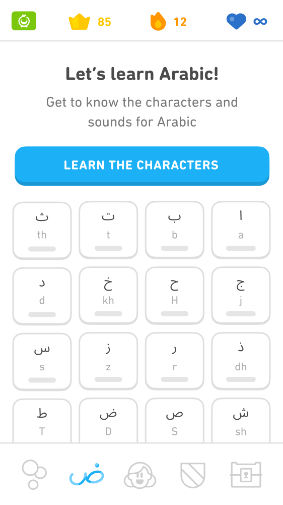 Screenshot of the Arabic course reading tab. The text at the top says "Let's learn Arabic! Get to know the characters and sounds for Arabic." Below the text is a blue button that reads "Learn the characters" and below that a 4 by 4 chart of white tiles for the different Arabic letters. Each tile has the Arabic letter, and below it the English letter or letters representing the sound.