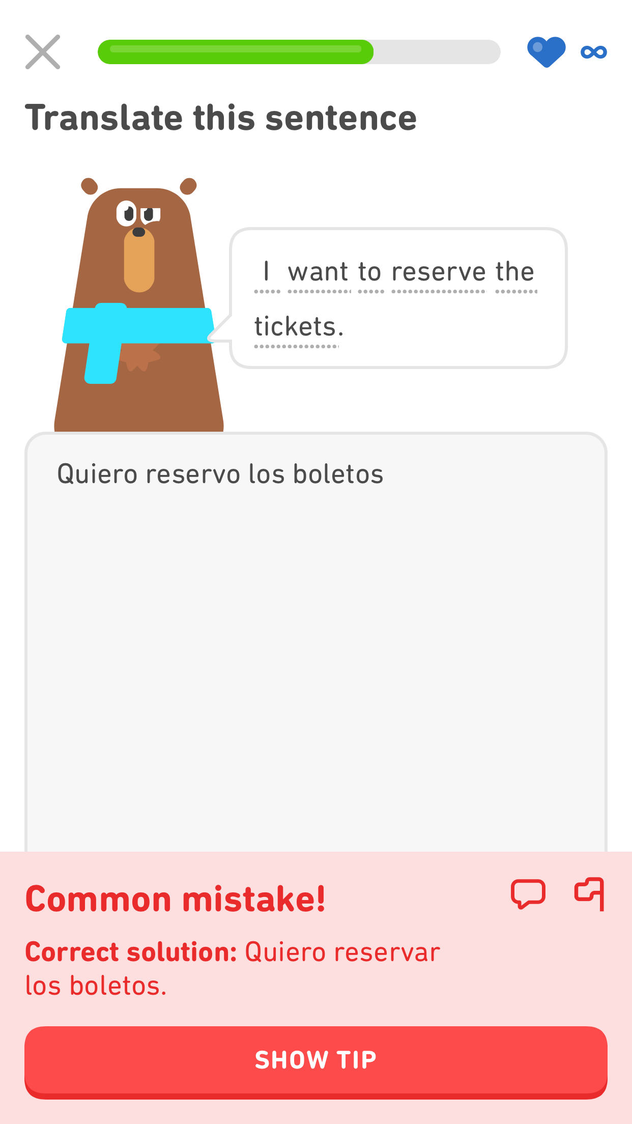 Screenshot of a Duolingo exercise with the bear character saying in English 