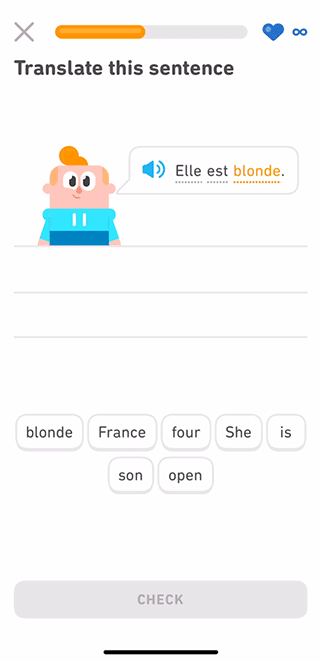 Gif of a Duolingo lesson where learner translates the sentence. Junior celebrates the correct answer.