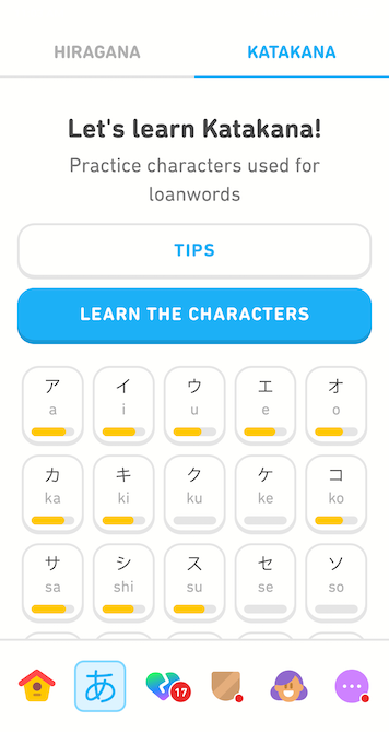 Screenshot of the practice tab. At the top it says "Let's practice Katakana! Practice characters used for loanwords" and below it are buttons for "Tips" and "Learn the characters." Most of the screen is a 5 x 3 row of "tiles" of the different katakana characters and a Roman letter representing the sound they make. The tiles continue if you scroll down.