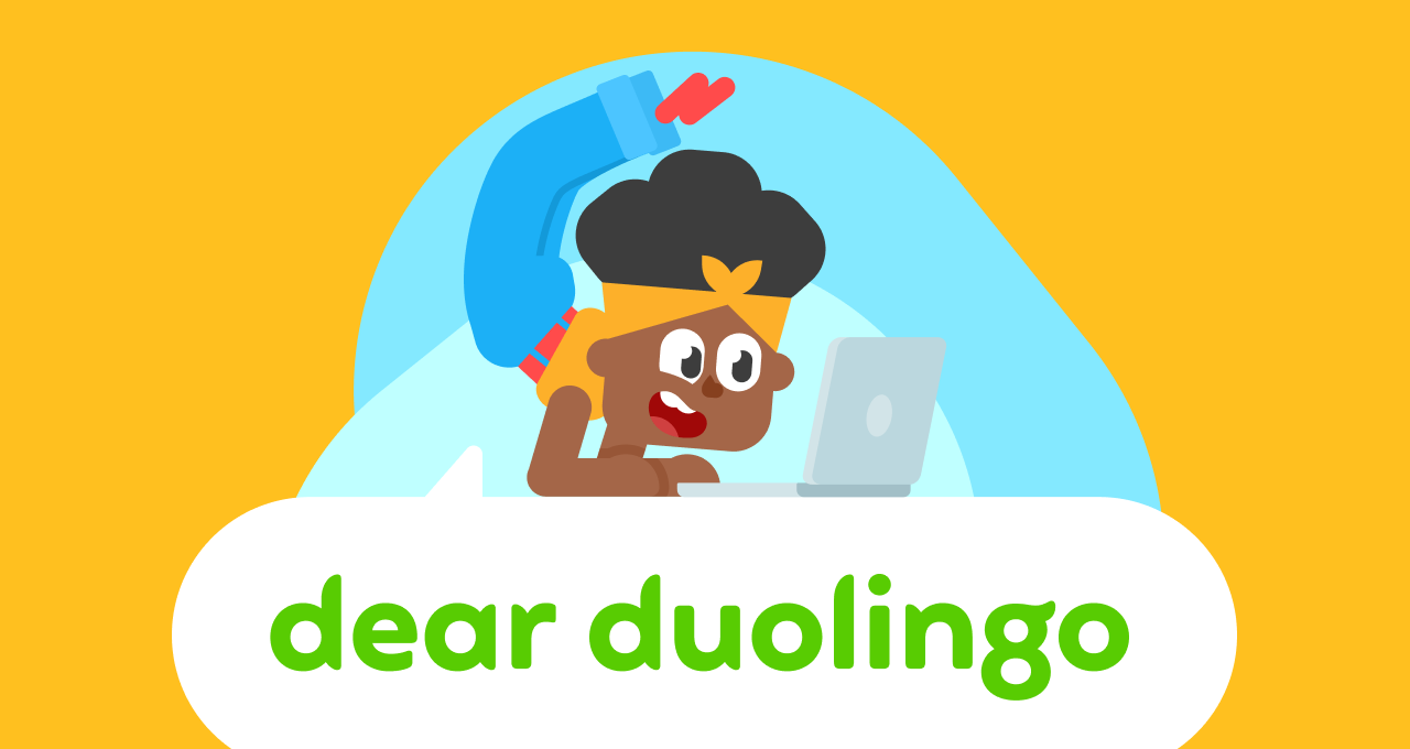 Dear Duolingo logo on an orange background with Bea lying on the logo, typing on a laptop, and her legs stretched above her head, as though in a yoga pose
