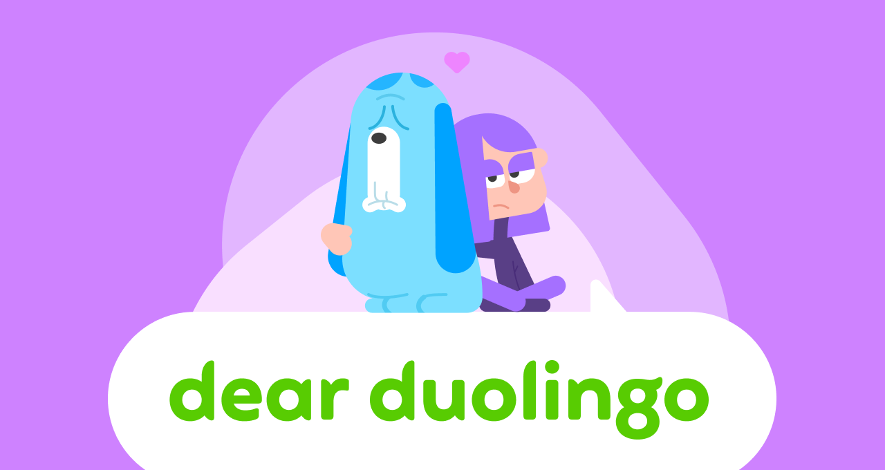 Dear Duolingo illustration with the Dear Duolingo speech bubble logo. Lily is sitting on top of the logo with her arm around a blue dog, and both are looking glum.