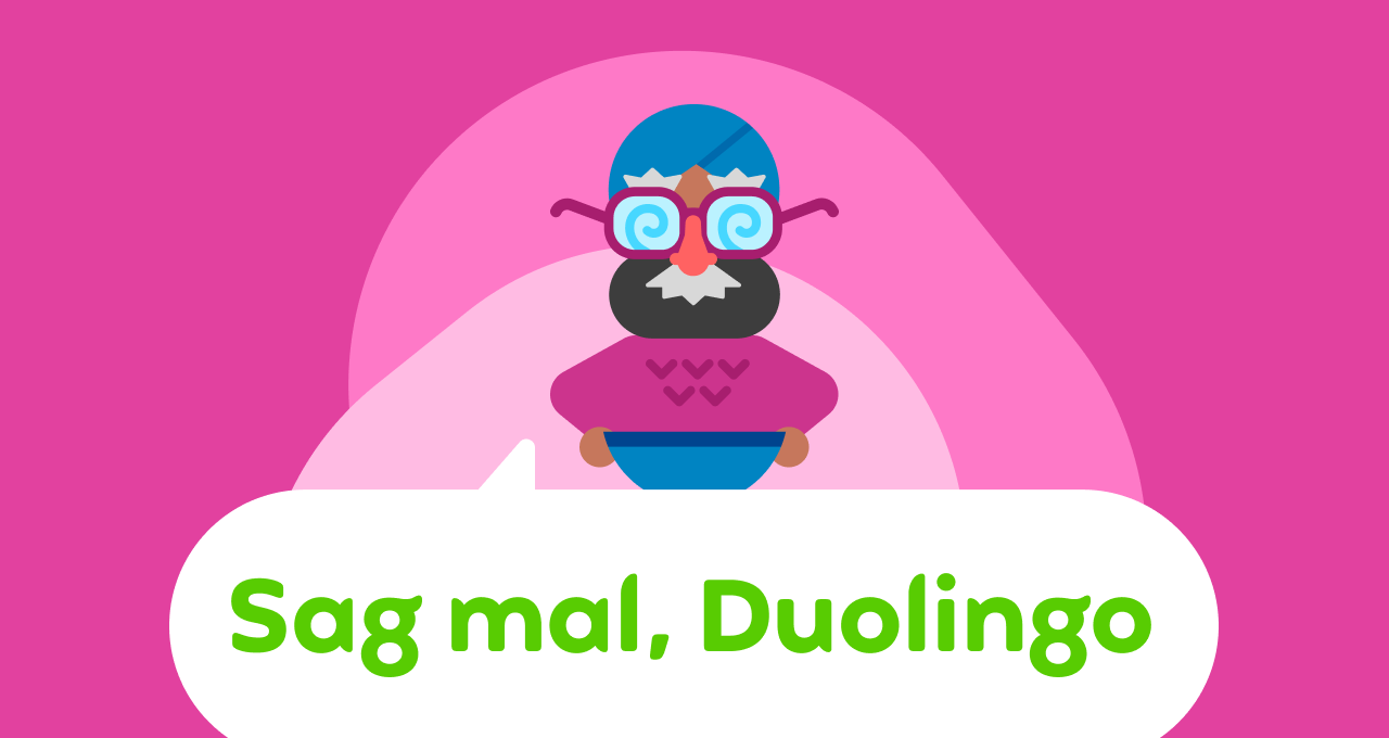 Abbildung des Logos „Sag mal, Duolingo“ in einer Sprechblase. Darüber steht Vikram, der eine Verkleidung aus Brille, Nase und Schnurrbart trägt.
