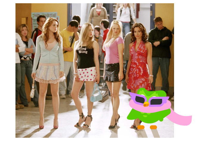Still shot from "Mean Girls" of the four girls in the Plastics standing next to each other with the Duolingo owl (wearing a boa and fancy sunglasses) photoshopped with them.