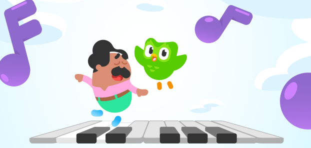 Los personajes de Duolingo, Óscar y Duo, bailan sobre el teclado de un piano . A su alrededor, giran unas notas musicales color violeta.