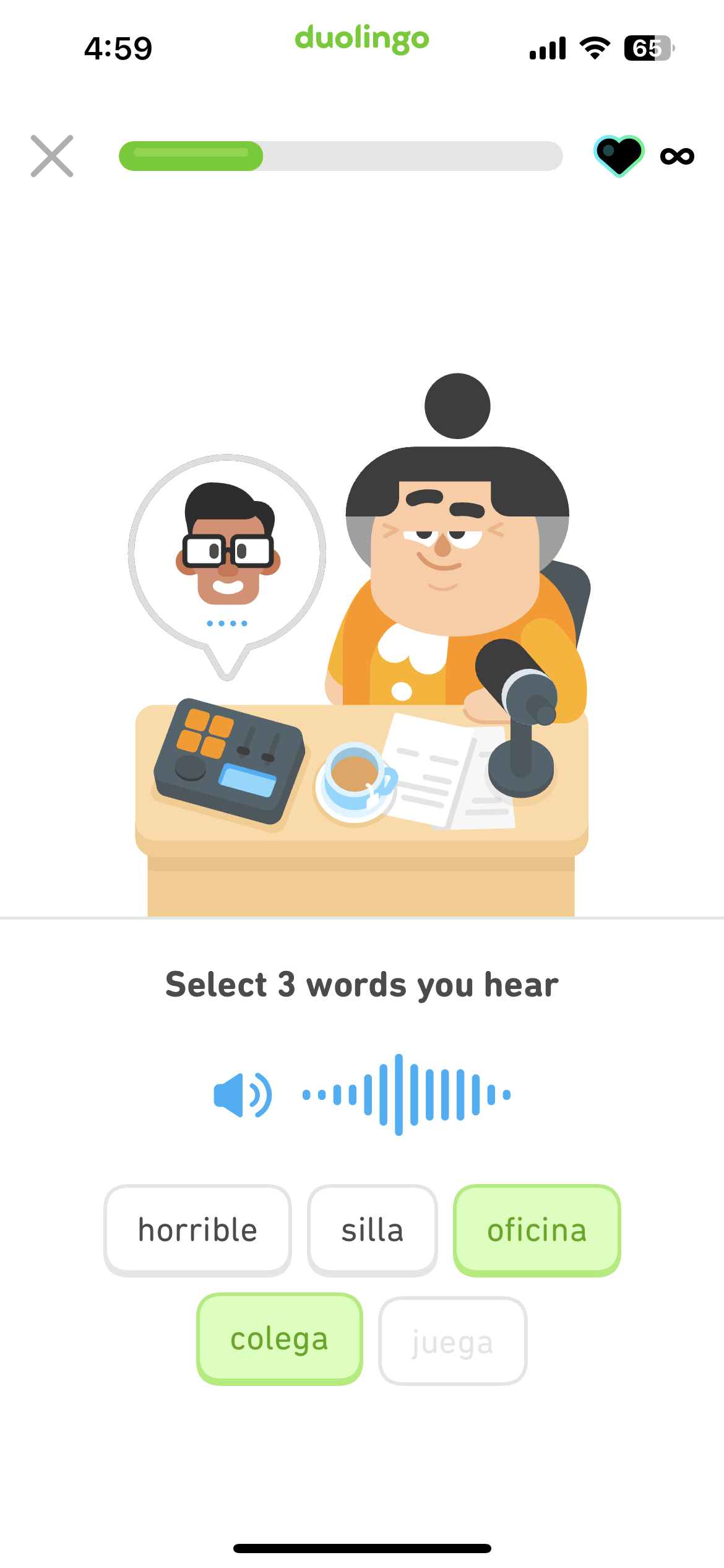 Screenshot of an illustration of Lucy sitting at her DuoRadio desk in front of a microphone. The instructions say 'Select 3 words you hear' followed by a blue speaker button and audio wave and a list of 5 Spanish word tiles to choose from.