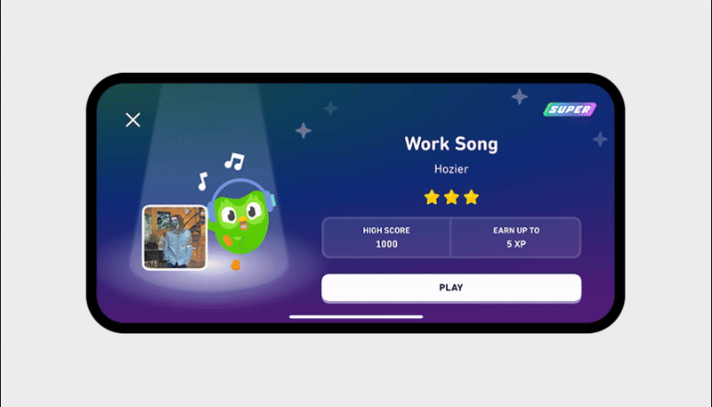 A gif of the popular music experience. The user is prompted to play Work Song by Hozier for up to 5 XP. A music staff appears with notes running along the screen. The learner taps the corresponding notes on the keyboard at the bottom of the image while the notes move from left to right across the screen.