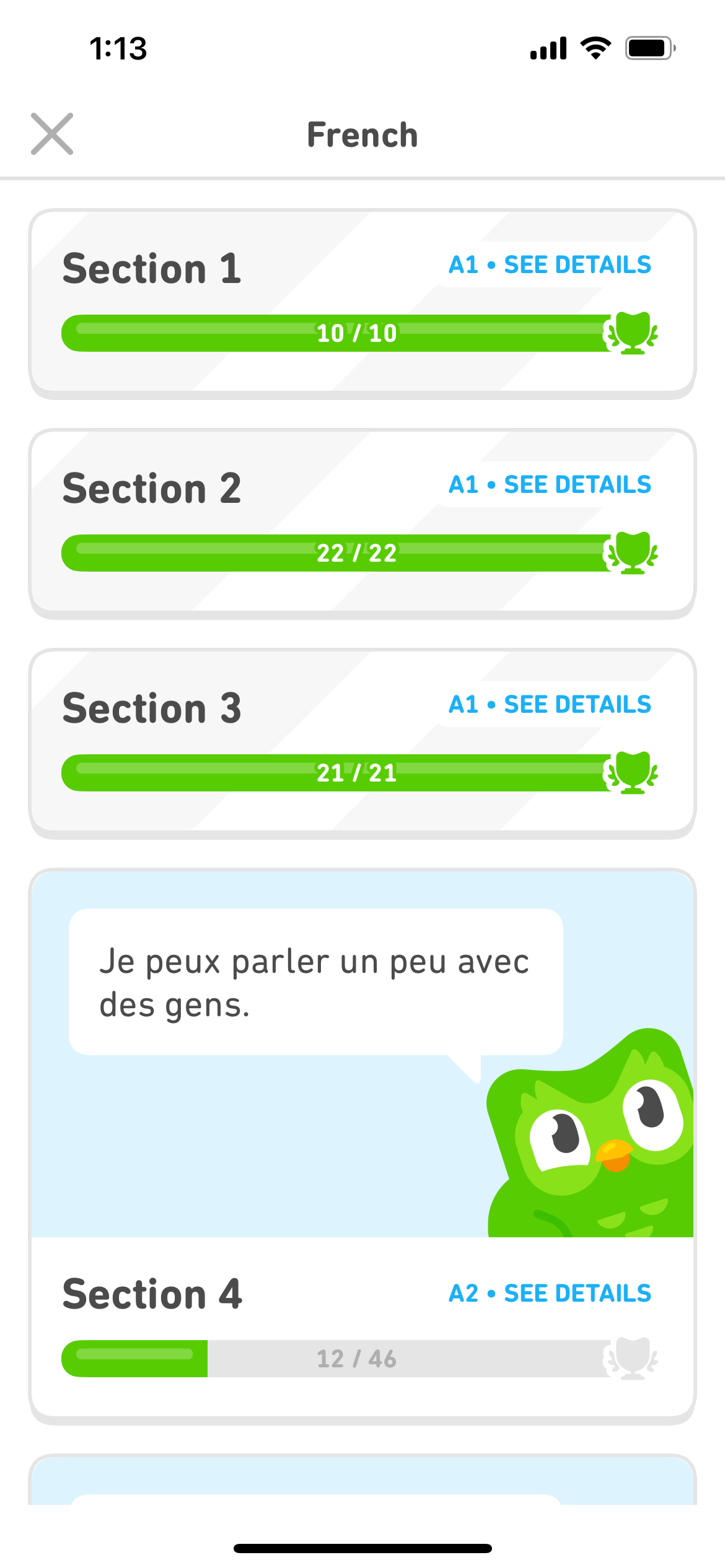 Screenshot of the French course section menu showing Sections 1-3 completed and Section 4 partly completed