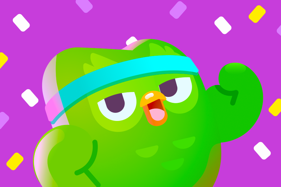 Duo the owl wearing a sweat band, flexing his arm, with confetti falling around him