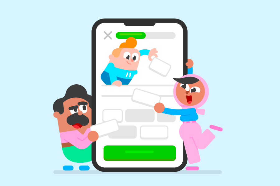 Oscar, Junior, and Zari working together to complete a Duolingo exercise on a huge smartphone
