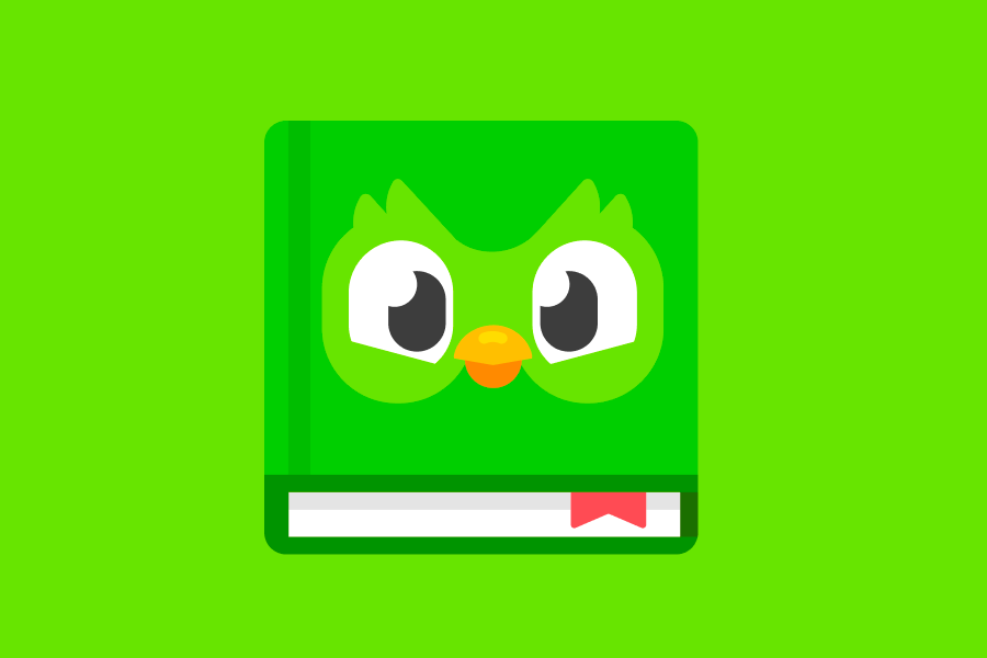 Un livre vert avec le visage de Duo sur la couverture et un marque-page rouge
