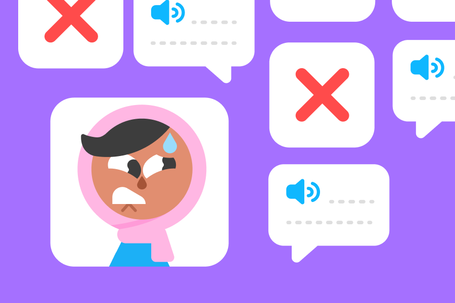 吹き出しと赤いバツ印に囲まれ、外国語で間違うことにストレスを感じているザリのイラスト。