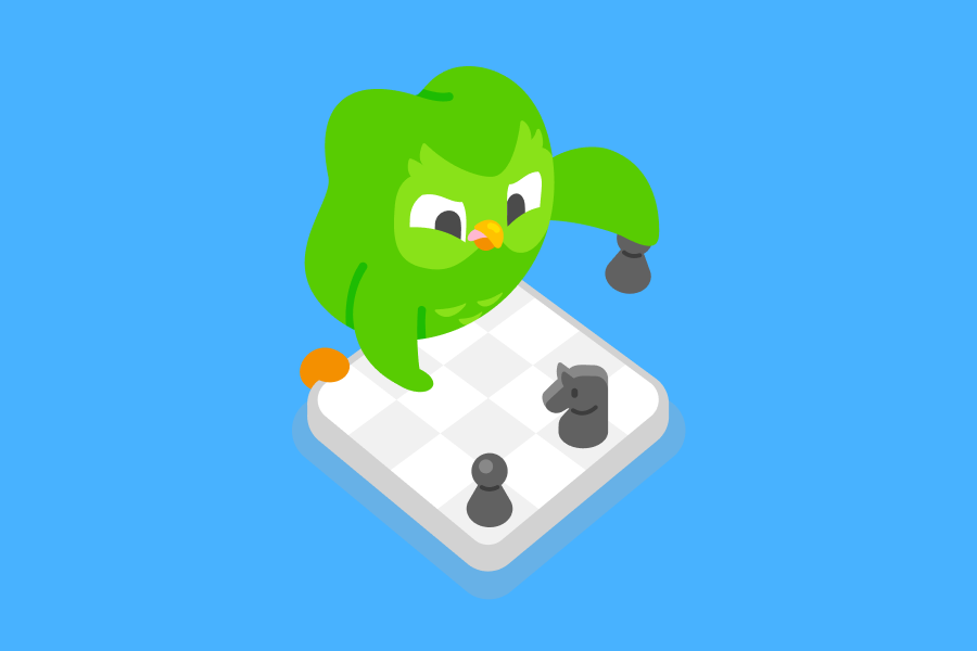 Duo the owl is leaning over a chess board holding a pawn, with a determined expression on his face.