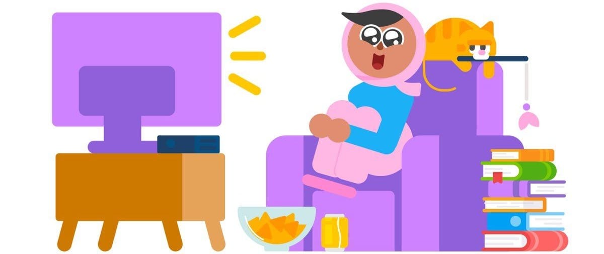 Duolingo character Zari is watching TV sitting on a large armchair with a bowl of chips on the floor. Behind her, a pet cat is playing with a toy. There is a large stack of books next to the chair.