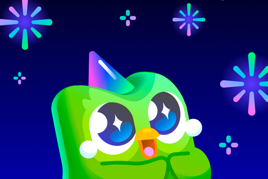 Duo the owl with tears in his eyes, wearing a party hat and looking up at multi-colored fireworks